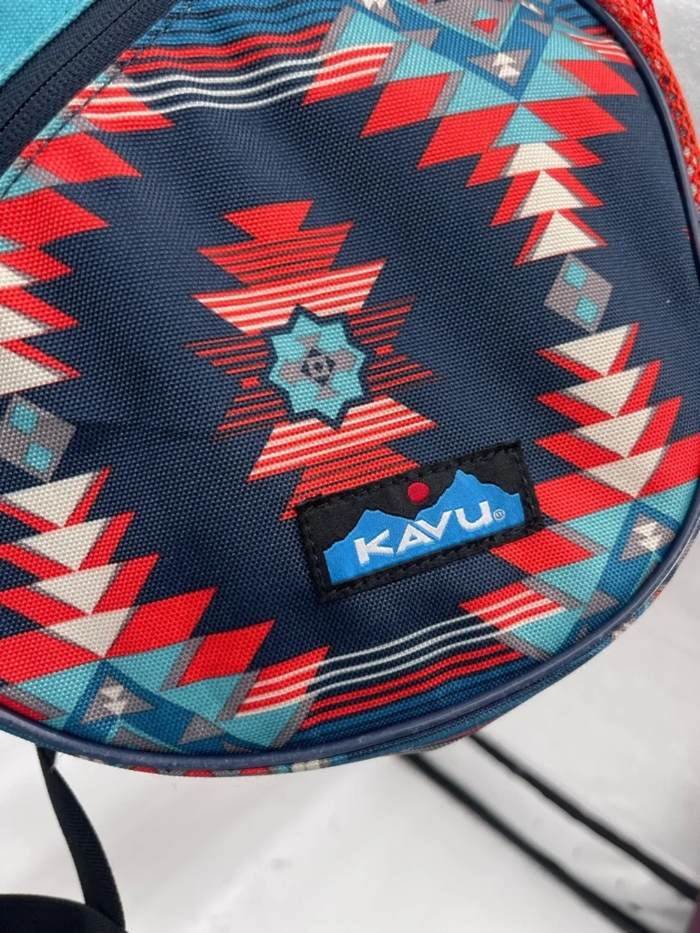 Kavu blue red aztec print sling back bag